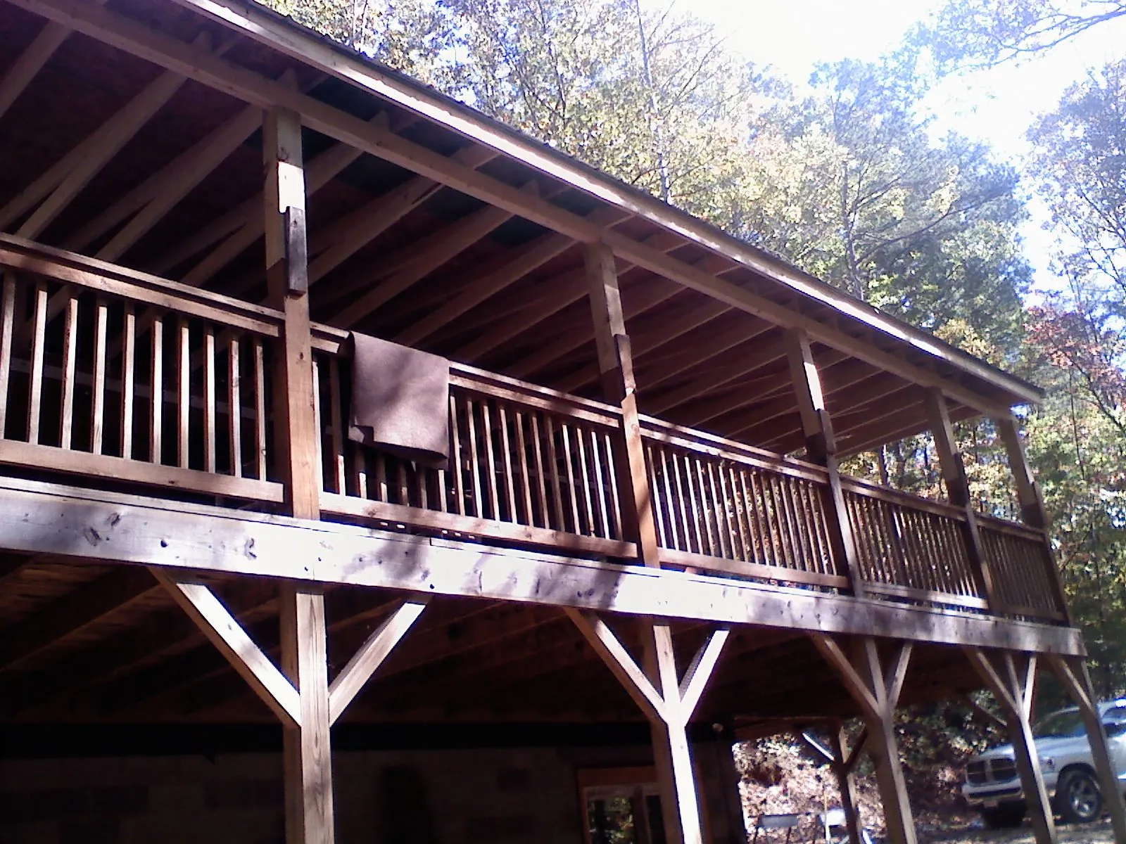 Timber framing under a new elevated porch and deck — Roof Leak Repair in Corral by Roofing Brothers